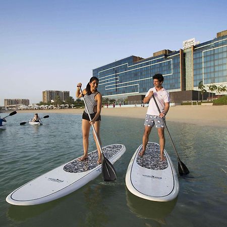 Fairmont Bab Al Bahr Hotel Abu Dhabi Exterior foto Stand Up Paddle Boarding at Jumeirah Beach Hotel